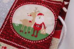 Adventskalender-Säckchen "Weihnachtsmann", handgenäht, klassisch rot-weiß, mit Holzklammern und -zahlen, z. Selbstbefüllen, wiederverwendbar, nachhaltig – Bild 8